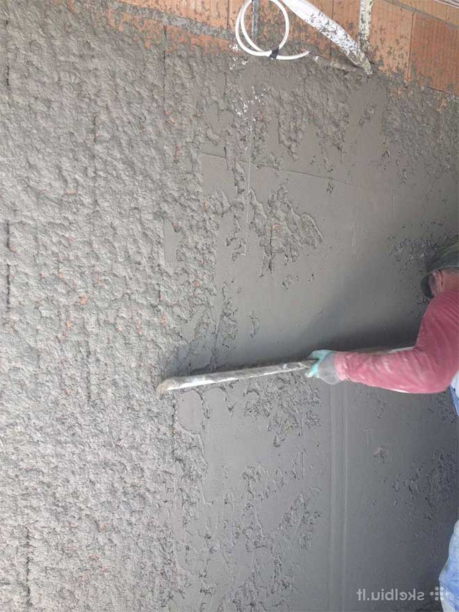 Как правильно оштукатурить кирпичную стену?